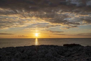 Acrylglasbild Sonnenuntergang am Meer